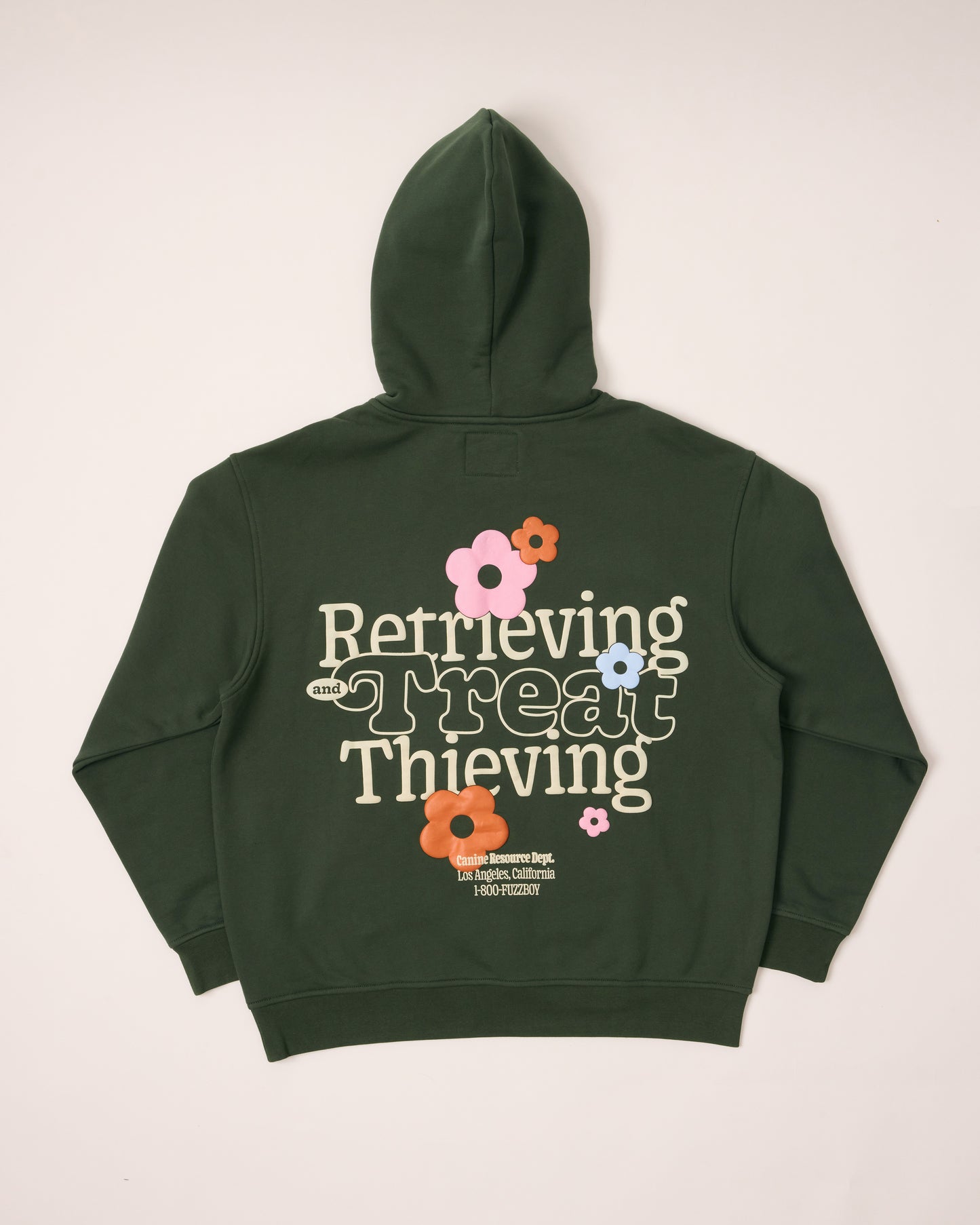 Forest green hoodie with text and floral designs on the back. The text reads "Retrieving and Treat Thieving, Canine Resource Dept. Los Angeles California, 1-800-FUZZBOY.